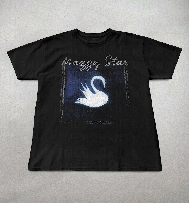 May include: Black t-shirt featuring a white swan graphic and the text "Mazzy Star" printed on the front.