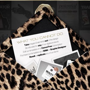 May include: An open envelope with a leopard print design, revealing several cards and a smartphone. The cards feature text and graphics, including the words "BEAUTY" and "WHAT YOU CANNOT DO". The background includes magazine covers.