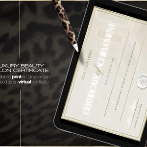 May include: A digital certificate of achievement on a tablet. The certificate has a gold border and a cream background with the text "Certificate of Achievement". A stylus with a leopard print design is next to the tablet.