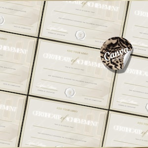 May include: A collection of beige certificates of achievement with gold borders and elegant typography. Each certificate includes space for a logo, date, and signature. A round sticker with a leopard print and the word "Canva" is on top.