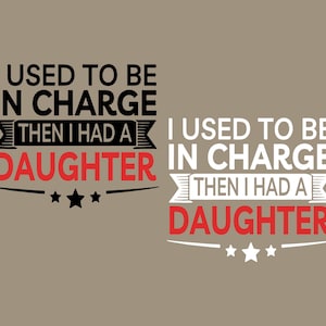 May include: Two designs with the text "I USED TO BE IN CHARGE THEN I HAD A DAUGHTER". The text is in black and red on a tan background. One design is in black and red, the other is in white and red.