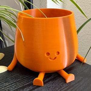Happy Face Plant Pot with Arms & Legs – Cute Sitting Planter in Bright or Earthy Colors, Multiple Sizes