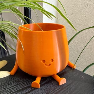 Happy Face Plant Pot with Arms & Legs – Cute Sitting Planter in Bright or Earthy Colors, Multiple Sizes