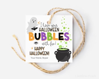 May include: A square Halloween gift tag with a ghost, bat, spider, and cauldron illustration. The tag reads "I hope your Halloween bubbles with fun! Happy Halloween!" and is tied with twine.