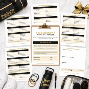 May include: A cheer camp packing list and prep guide printed on white paper with black and gold text, organized into sections on a clipboard. The set includes checklists for clothing, toiletries, first aid, snacks, and camp notes, alongside a water bottle.
