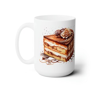 May include: White ceramic mug with a watercolor illustration of a slice of cake with chocolate frosting and a decorative flower on top.