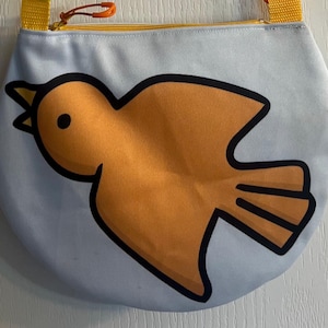 Bandolera de pájaro azul y naranja