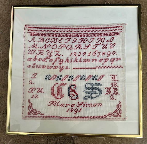 スウェーデン製、1891年作のアンティーク手縫い刺繍サンプラー 
