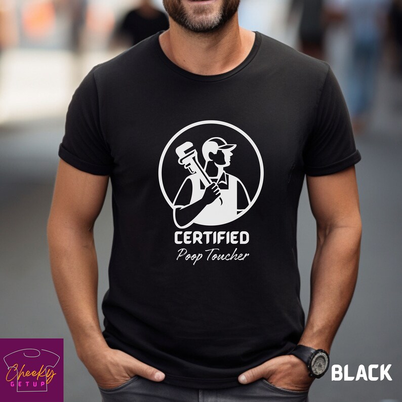 May include: Black t-shirt with a white graphic of a plumber holding a wrench. The text "CERTIFIED Poop Toucher" is printed below the graphic.