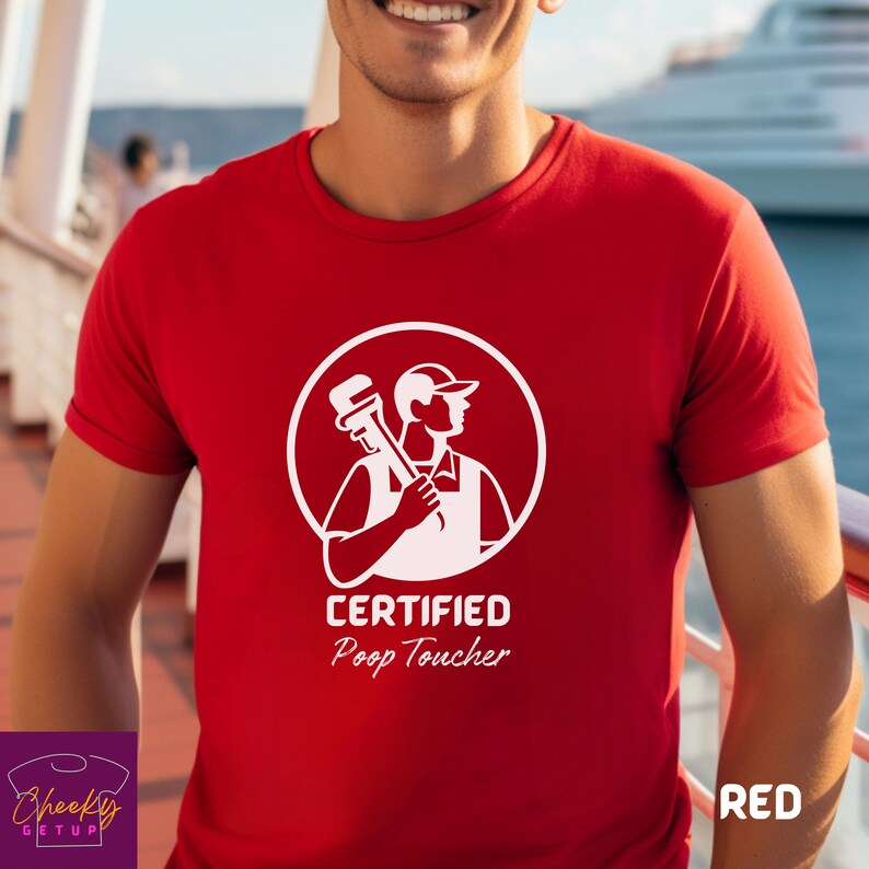 May include: Red t-shirt with a white graphic of a plumber holding a wrench and the text "CERTIFIED Poop Toucher".