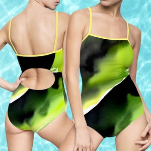 Jamrock Bold Women&#39;s One-piece Swimsuit with Cut Out Back. Black, green and gold.