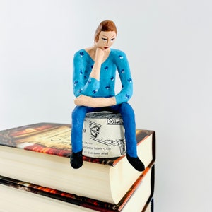 Sitting woman,Thinker, sculpture, contemplating,paper mache