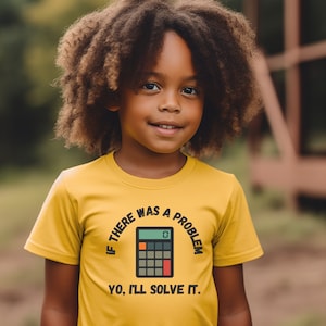 May include: A young person wearing a yellow t-shirt with a graphic of a calculator and the text "If there was a problem, yo, I'll solve it."