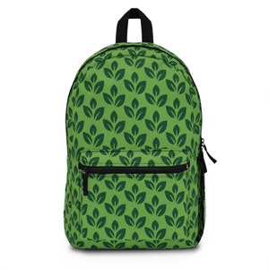May include: A green backpack with a leaf pattern. The backpack has a black zipper and a mesh pocket on the side.