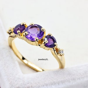 14k Gold Amethyst Ring: Three Stone Round Solitaire
