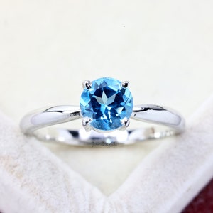 Solitaire Swiss Blue Topaz Ring: Sterling Silver, November Birthstone