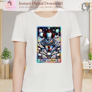 May include: White t-shirt featuring a tarot card design with a clown illustration. The card has a colorful border and the text "THE CLOWN". The shirt also has the text "Instant Digital Download" and "HIGH RESOLUTION - ALL IMAGES >300 DPI".