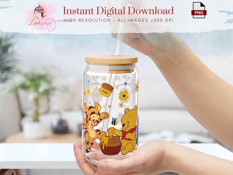 May include: A clear glass jar with a wooden lid and a straw. The jar has a Winnie the Pooh and Tigger design with the words "Honey" and flowers.