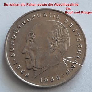 Può includere: Una moneta tedesca d'argento con il testo "Bundesrepublik Deutschland" e gli anni "1949" e "1969" attorno al bordo. La moneta presenta un profilo di un uomo.