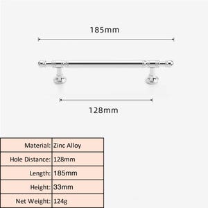 May include: A silver cabinet pull with a bar design, 18.5cm long, with a 12.8cm hole distance. The pull has decorative end pieces and is made of zinc alloy. The height is 3.3cm, and the net weight is 124g.