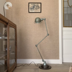 Renovated Jieldé Tablelamp with 2 arms for mounting on desk. Original colour.