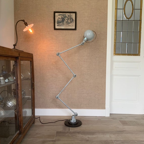 Renovated Jieldé Tablelamp with 2 arms for mounting on desk. Original colour.