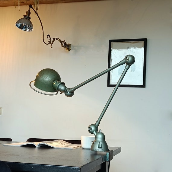 Renovated Jieldé Tablelamp with 2 arms for mounting on desk. Original colour.