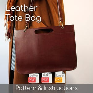 May include: A burgundy leather tote bag with a handle cutout and shoulder straps. The bag has a rectangular shape with rounded corners. Text on the image reads "Leather Tote Bag" and "Pattern & Instructions".