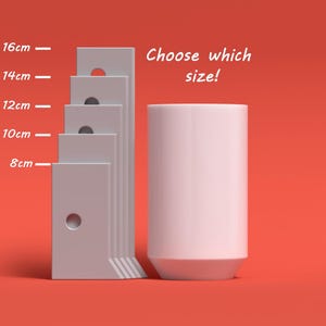 May include: A white ceramic mug next to a set of five grey rectangular blocks with holes. The blocks are labelled with measurements in centimetres: 8cm, 10cm, 12cm, 14cm, and 16cm. The text "Choose which size!" is written above the mug.