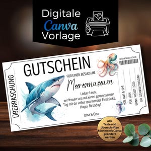 Può includere: Un buono regalo bianco con illustrazioni di squalo e polpo, con il testo tedesco "GUTSCHEIN" e "Meeresmuseum". Il certificato include il testo "Happy Birthday!" e "Digitale Canva Vorlage".