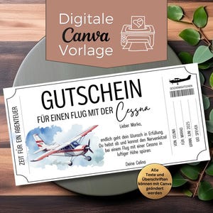 Peut inclure: Un bon cadeau blanc avec le texte "GUTSCHEIN" et "FÜR EINEN FLUG MIT DER Cessna". Il présente une illustration à l'aquarelle d'un petit avion. Le bon est sur une assiette grise avec de la verdure.