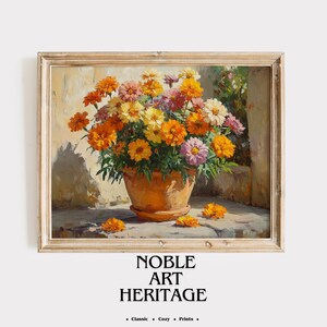 May include: A framed painting of a terracotta pot overflowing with colorful flowers in shades of orange, yellow, and pink. The artwork is set against a neutral background, with the text "NOBLE ART HERITAGE" at the bottom.