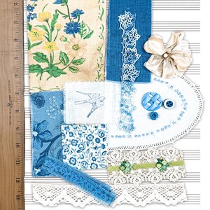 May include: A collection of fabric swatches and embellishments in shades of blue, cream, and white. Includes floral prints, lace trim, buttons, and a fabric flower. The text "SET 1" is visible at the top. A wooden ruler is in the image.