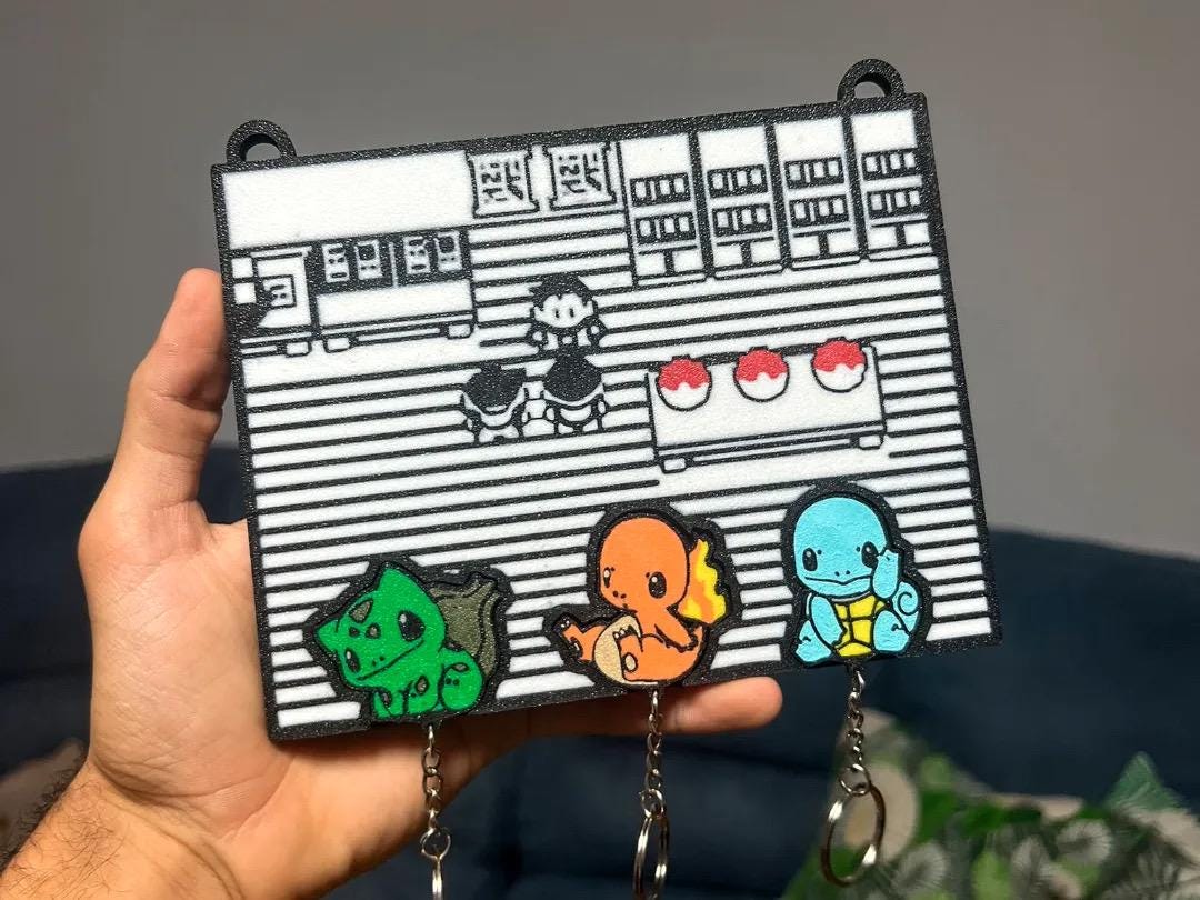 Porta llaveros retro / Gancho para llaveros inspirado en dibujos animados para gamers y fanáticos / Organizador divertido para llaveros de criaturas principiantes