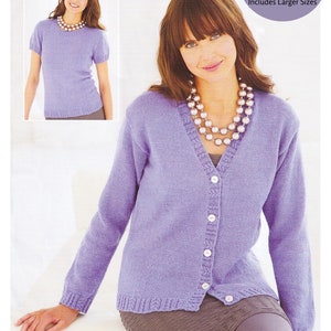 May include: A purple cardigan with a V-neck and button closure. The cardigan is made with a 4-ply fingering yarn and is available in sizes 32/34 to 52/54 inches.