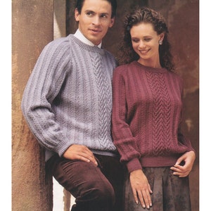 May include: Two people wearing cable knit jumpers. The man is wearing a light purple jumper and the woman is wearing a burgundy jumper. The text on the image reads "4 Ply / Fingering Yarn 30 to 46 ins".