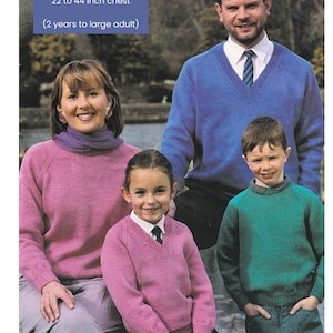 May include: A family of four wearing knitted sweaters in various colors. The sweaters are all round neck or V-neck. The text on the image reads "DK / 8 Ply Yarn Round & V-Neck 22 to 44 inch chest (2 years to large adult)"
