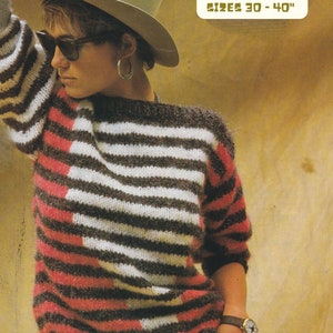 May include: A chunky yarn slash neck sweater in a retro style. The sweater features horizontal stripes in brown, white, and red. The image also includes a hat, sunglasses, and the text "CHUNKY YARN SLASH NECK SWEATER SIZES 30-40".