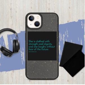 May include: A black phone case with a gray, textured surface. The case has a white square with black text that reads "She is clothed with strength and dignity, and she laughs without fear of the future."