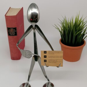 Figur aus Besteck "Visitenkarte"