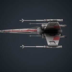 Puede incluir: Una nave espacial de combate estelar blanca y roja con dos juegos de alas y dos juegos de ca&ntilde;ones l&aacute;ser. La nave espacial est&aacute; volando en el aire.