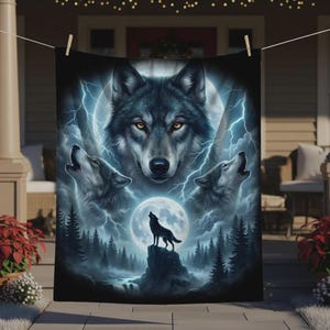 May include: A rectangular blanket featuring a large wolf face at the top, two howling wolves on the sides, and a lone wolf standing on a rock against a full moon. The scene includes a dark forest, a flowing river, and bright blue lightning bolts.