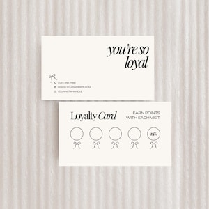 May include: Two rectangular loyalty cards with black text on an off-white background. The top card reads "you're so loyal." The bottom card says "Loyalty Card" and "Earn points with each visit." There are circles and bows.
