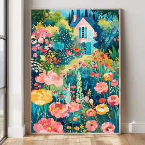 May include: A framed art print of a colorful garden scene. The artwork features a pink house with blue shutters surrounded by vibrant flowers in shades of pink, yellow, and red. The background is a mix of green foliage and a blue sky.