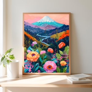 Puede incluir: Una impresi&oacute;n art&iacute;stica enmarcada que presenta un paisaje monta&ntilde;oso con una cima nevada, un r&iacute;o y flores coloridas. La obra de arte utiliza una paleta de naranja, rosa, azul y verde, creando una escena vibrante y atractiva.