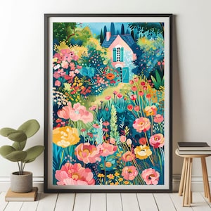 May include: A framed art print featuring a colorful illustration of a cottage surrounded by a vibrant garden. The artwork showcases a pink house with blue shutters, nestled among lush flowers in shades of pink, yellow, and red, set against a backdrop of green foliage.