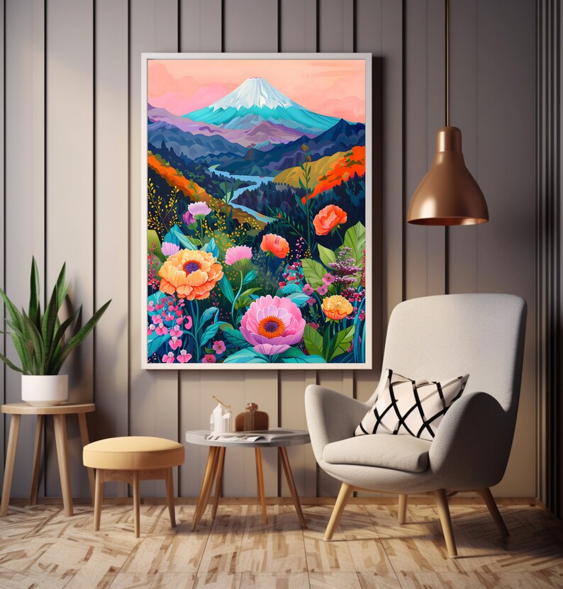 Puede incluir: Una impresi&oacute;n art&iacute;stica enmarcada representa un vibrante paisaje monta&ntilde;oso con una cima nevada, un r&iacute;o sinuoso y flores coloridas. La obra de arte presenta una paleta de rosas, naranjas, azules y verdes. La impresi&oacute;n se exhibe en un sal&oacute;n moderno con una silla y mesas auxiliares.
