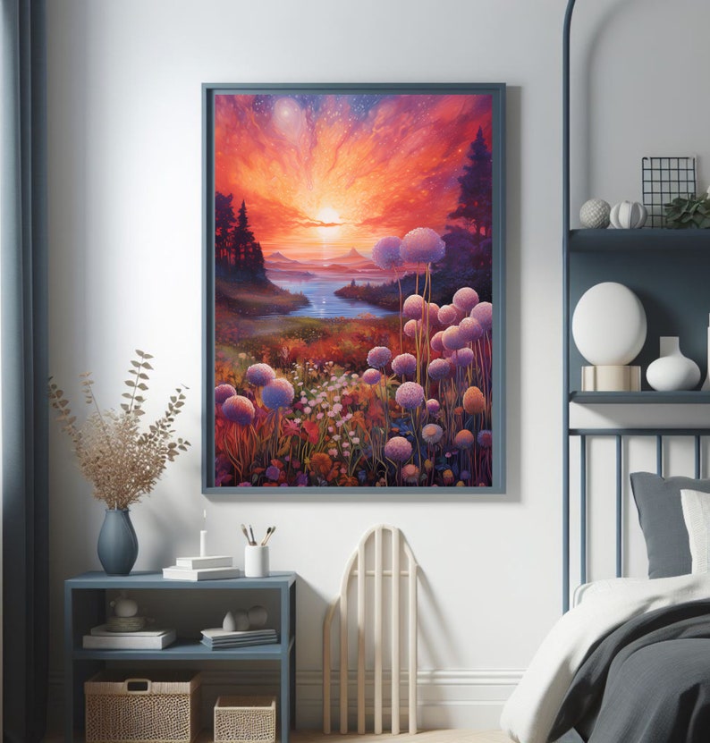 Puede incluir: Impresi&oacute;n art&iacute;stica enmarcada de un paisaje con una puesta de sol sobre un r&iacute;o y un campo de flores. La obra de arte presenta un cielo colorido con tonos de naranja, rojo y morado. El primer plano incluye flores moradas y blancas, y el marco es azul apagado.
