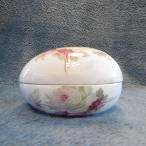 Porcelain painted egg shaped trinket box