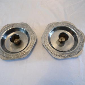 Pair of embossed metal candlestick holders 1950s